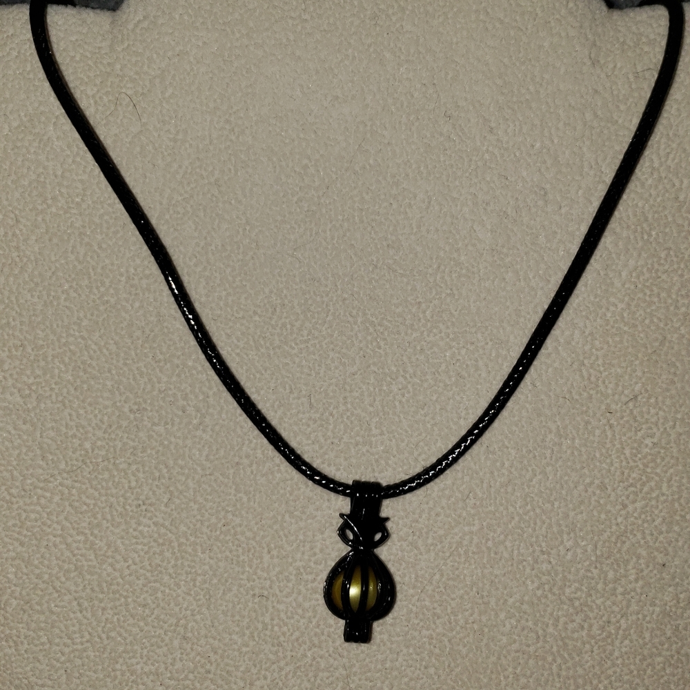 Genuine pearl cage necklace